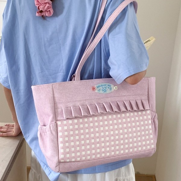 Xiao Duoduo uses a large-capacity canvas bag for a single shoulder, a new stylish and eye-catching lace tote bag for a backpack full figure