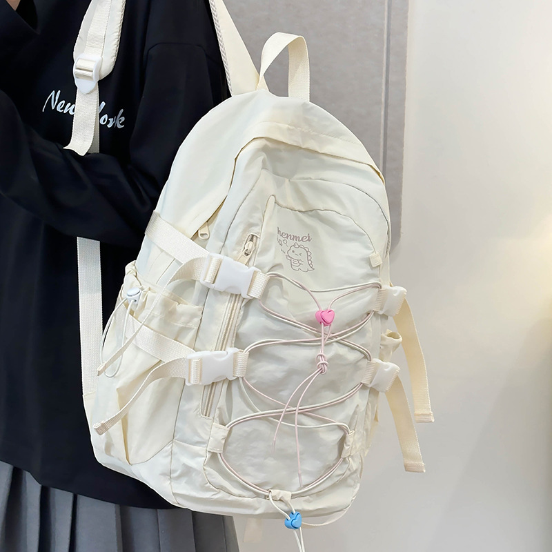 This backpack is light and versatile for women, with a laid-back style. It has a high level of appearance and a drawstring. It is a large-capacity travel backpack and a school bag for college students full figure