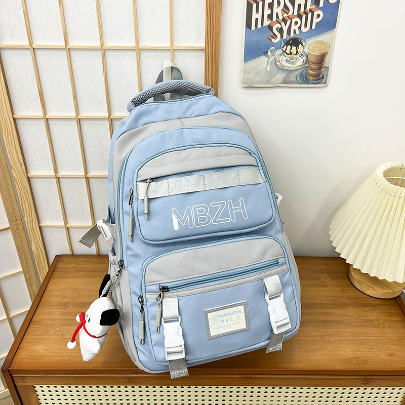 The new schoolbag is a large-capacity backpack for girls in junior and senior high school, and a color-matched backpack for students in grades three to six of primary school Specification drawing
