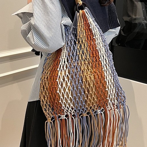 New straw woven bag, cotton rope handbag, cross-cut hollowed-out women's bag, beach bag, single-shoulder fashionable hollowed-out tassel underarm bag Application Scenario