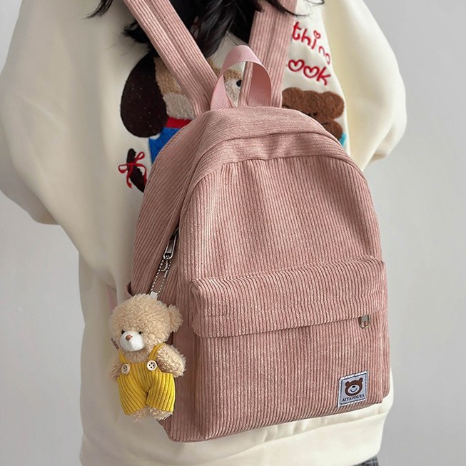 The new autumn/winter 2024 fashion girls' backpack, cute solid-colored small backpack, travel and study bag, corduroy backpack full figure