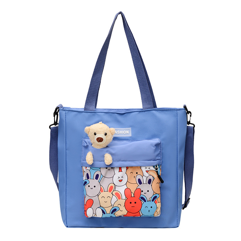 A cute Korean version of a schoolbag for junior high school students to relieve their burden, a cute cartoon single-shoulder bag for primary school students to take extra classes, and a cute one-shoulder bag for study Tours and autumn outings Item Picture