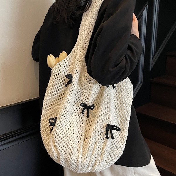 Fashionable bow hollowed-out woven bag, mesh bag for women, large-capacity single-shoulder vacation beach bag, lightweight fabric commuting bag details Picture