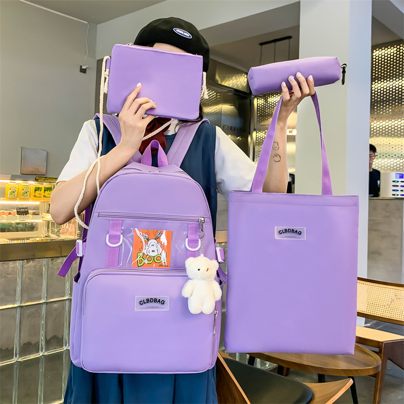 Wholesale of a new Japanese-style schoolbag with a cute and versatile campus style, a trendy four-piece backpack for primary school students Application Scenario