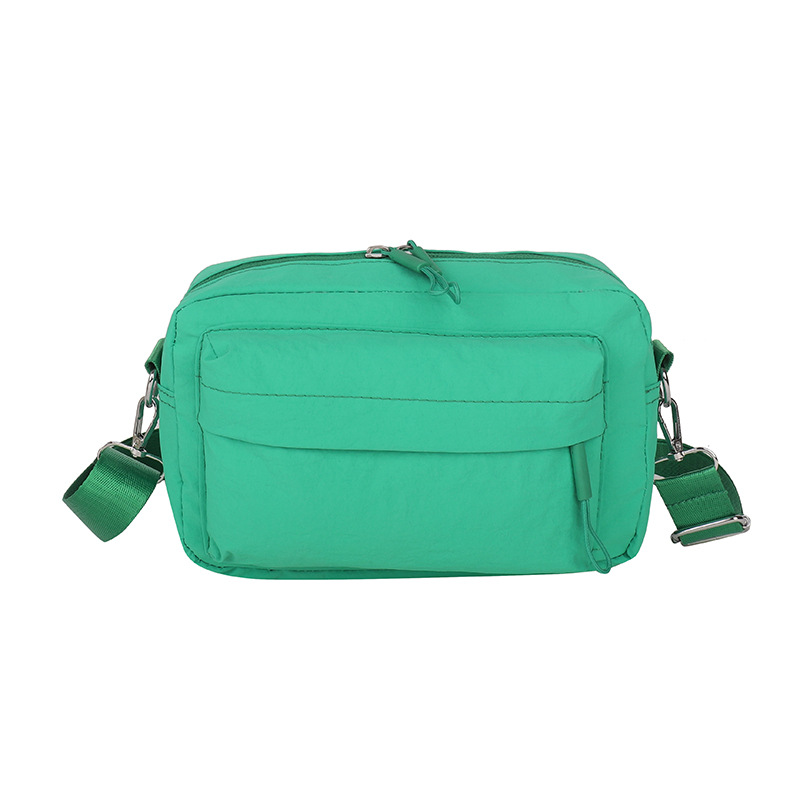 Korean-style simple crossbody bag for women's commuting, versatile nylon fabric women's bag, niche outdoor casual crossbody bag for women in solid colors Item Picture