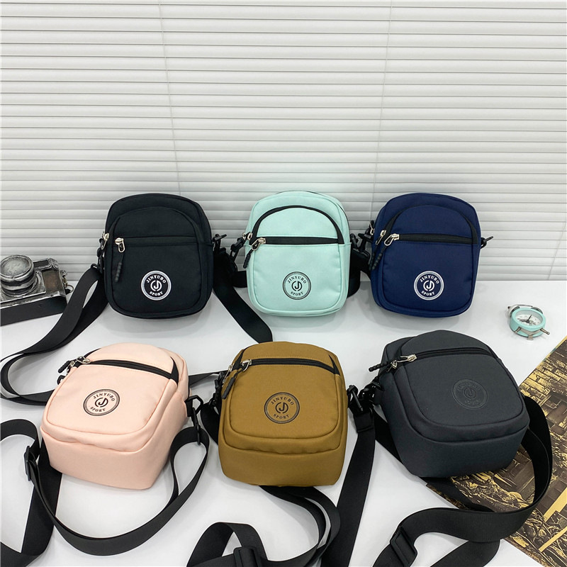 The new sporty and lightweight single-shoulder bag is a perfect match for ladies. It's a versatile bag for shopping, a mobile phone bag, a coin purse for street stalls and night markets, and a multi-functional backpack details Picture