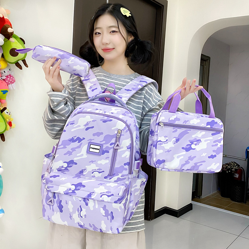 Wholesale of new trendy three-piece backpack sets for primary and junior high school double-layer campus bags and large-capacity durable backpacks for girls full figure