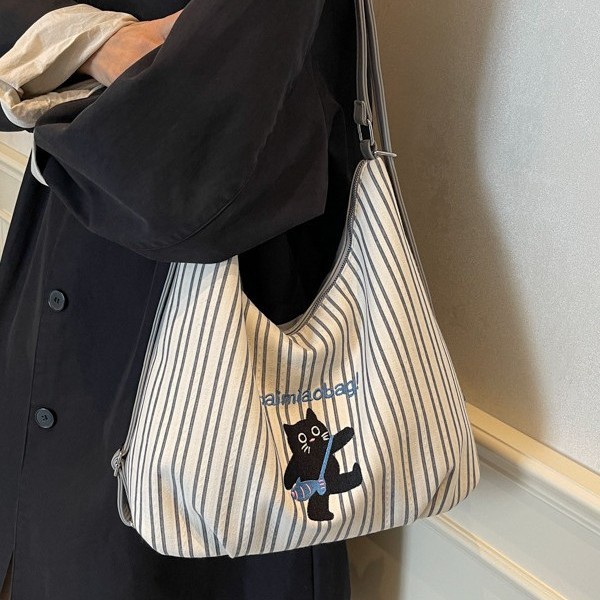 Korean-style backpacks, women's tote bags, striped canvas single-shoulder bags, crossbody bags, cute little cats, and fresh backpacks full figure