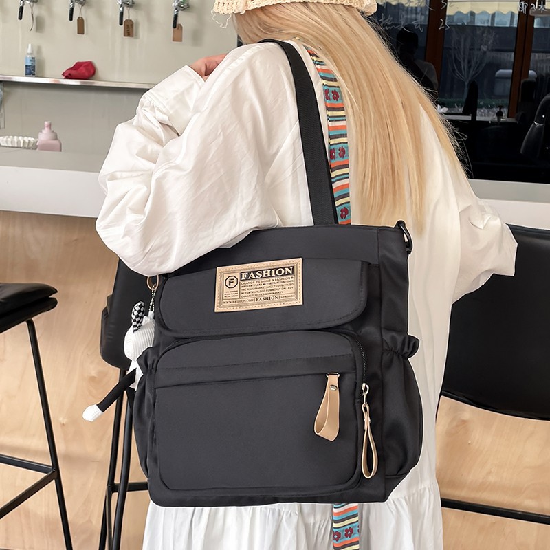 Schoolbag for female middle school students, large-capacity bag for male high school students, trendy single-shoulder bag, tutorial bag, Korean style versatile single-shoulder handbag full figure