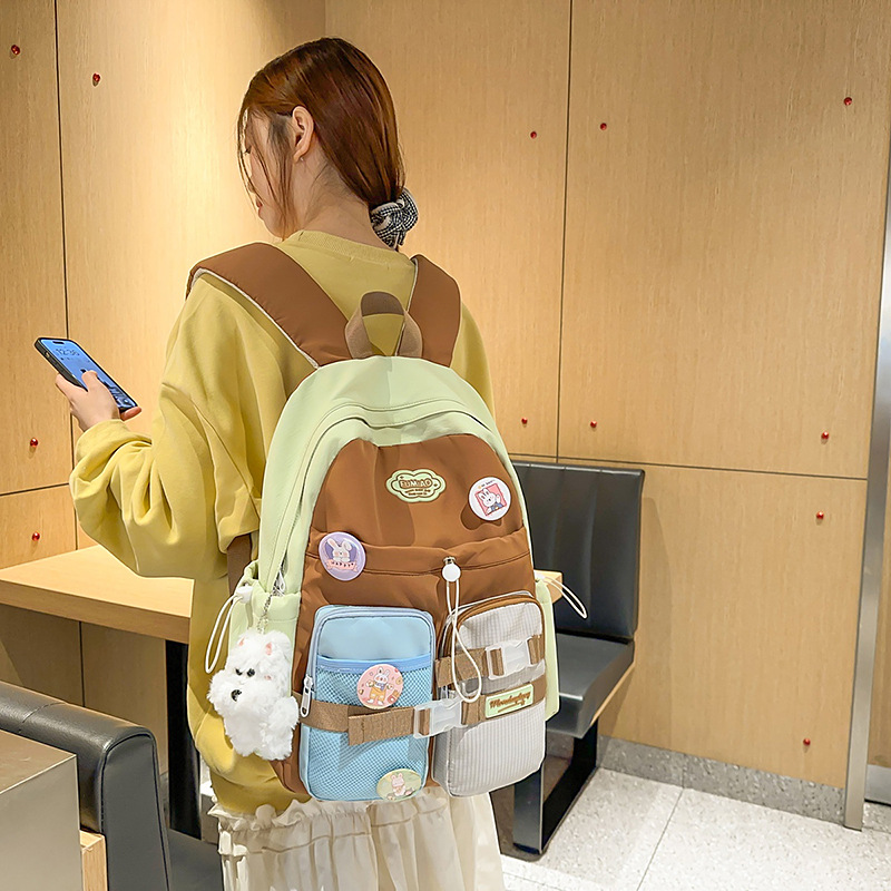 Color-blocking backpacks for junior high school students and college students, multi-layered niche design sense, lightweight backpacks 2025 new style full figure