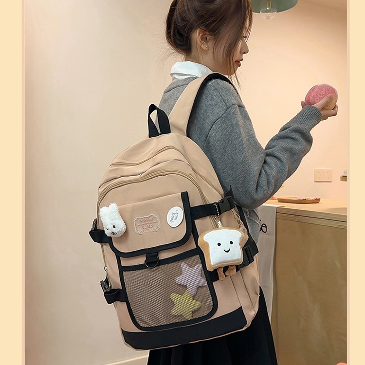 New large-capacity sturdy schoolbag for spring 2025, a backpack for girls, junior high school, senior high school and college students, and a casual commuting backpack full figure