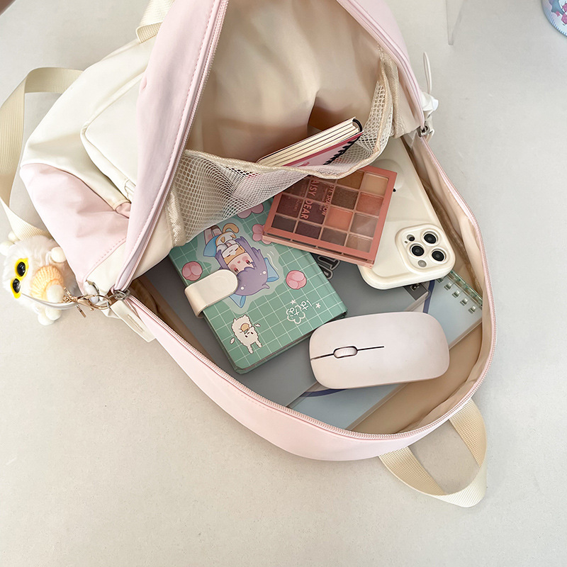 A female college student's Instagram-style forest-themed backpack with a high level of appearance and a soft girl. It features a color-blocking and versatile large-capacity campus backpack Application Scenario