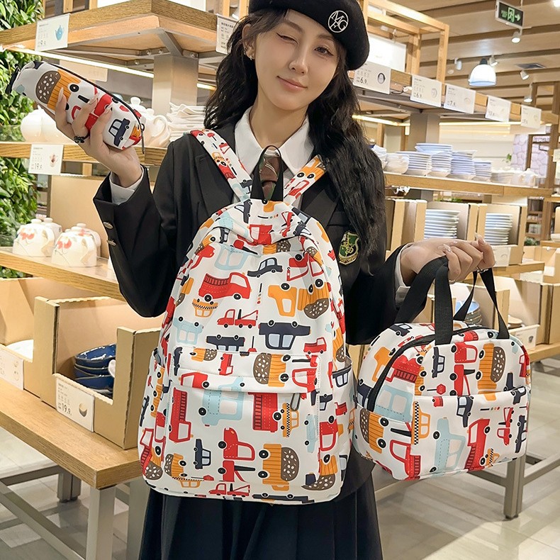 Wholesale of 2025 new backpack printed graffiti multi-piece set, lightweight and large-capacity backpack for middle school students full figure