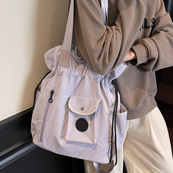 Lightweight backpack 2025 Spring New style Women's large-capacity versatile handbag, fashionable drawstring bag travel backpack Application Scenario