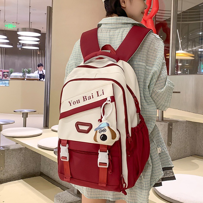 2024 New Korean version backpack with reduced load, color-matched large capacity short-distance travel backpack for college and high school students full figure