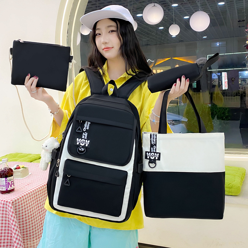 Large-capacity four-piece set, durable student backpack, junior and senior high school schoolbag, simple and versatile backpack for girls to go out and relax Application Scenario