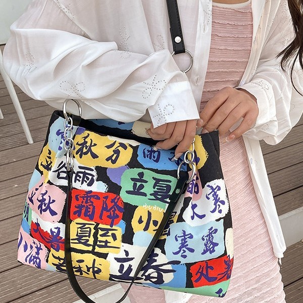 New cartoon-printed large-capacity tote bag for girls and students, a color-matched 24 solar terms design crossbody bag details Picture