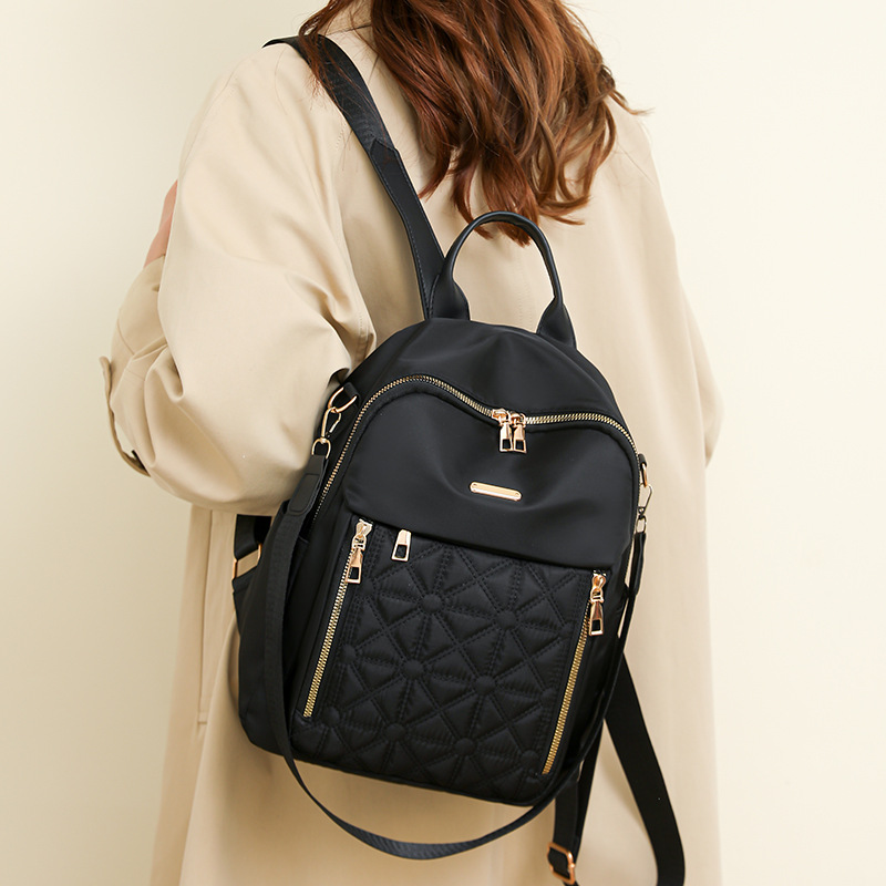 The new 2024 women's backpack with diamond-patterned embroidery thread is a versatile and large-capacity travel backpack that can be worn on one shoulder details Picture