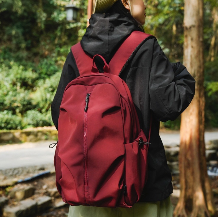 Lightweight, simple and solid-color backpack, casual and versatile. It's a school bag for high school students and a backpack for college students and couples traveling full figure