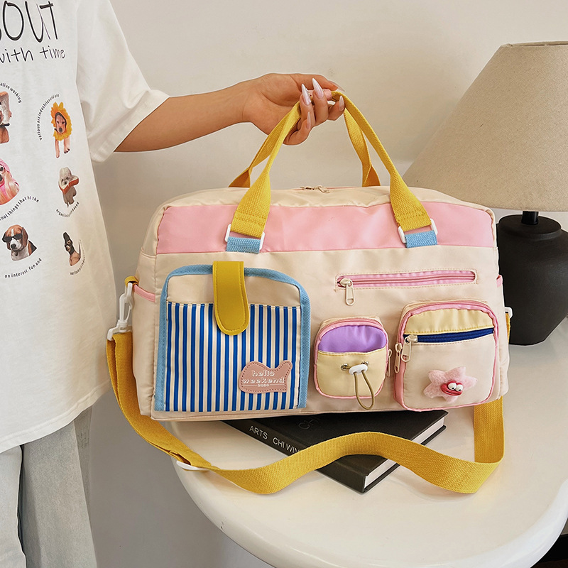 Korean version large-capacity short travel bag, cute girl back-to-school season luggage storage bag, large-capacity lightweight fitness bag full figure