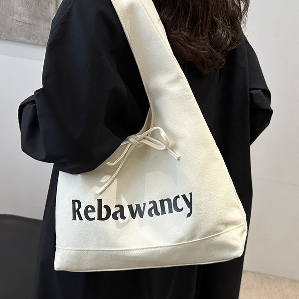 New niche lettered single-shoulder bag, large-capacity versatile fabric bag, women's canvas bag, single-shoulder underarm trendy shopping bag details Picture