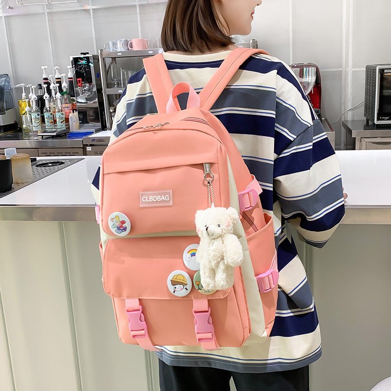 Korean version four-piece set, high school and junior high school student pendant decoration, forest-themed large-capacity backpack, simple and lightweight backpack Application Scenario