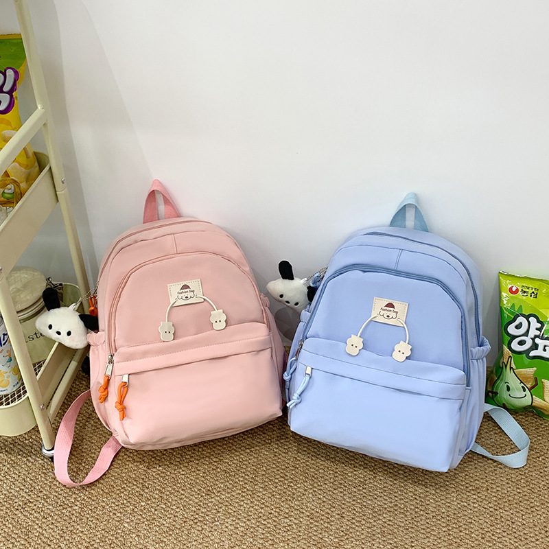 The trend of Japanese-style InS-style soft and cute girl backpacks, primary school schoolbags, and portable small backpacks for kindergarten travel full figure