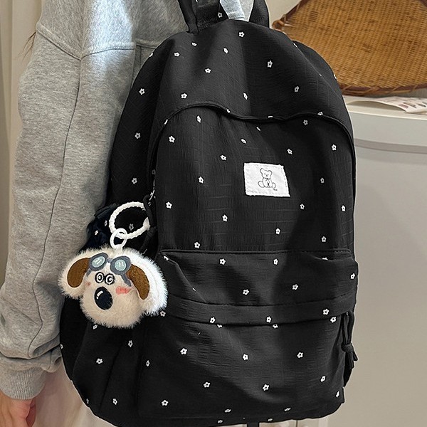 This new cute and ins-style polka dot backpack is lightweight for girls and versatile for students' school bags with a large capacity full figure