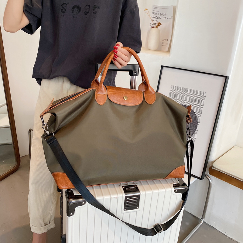 Large-capacity, lightweight, waterproof storage bag for women, short-distance business trip luggage bag, hand-held sports, yoga and fitness bag full figure