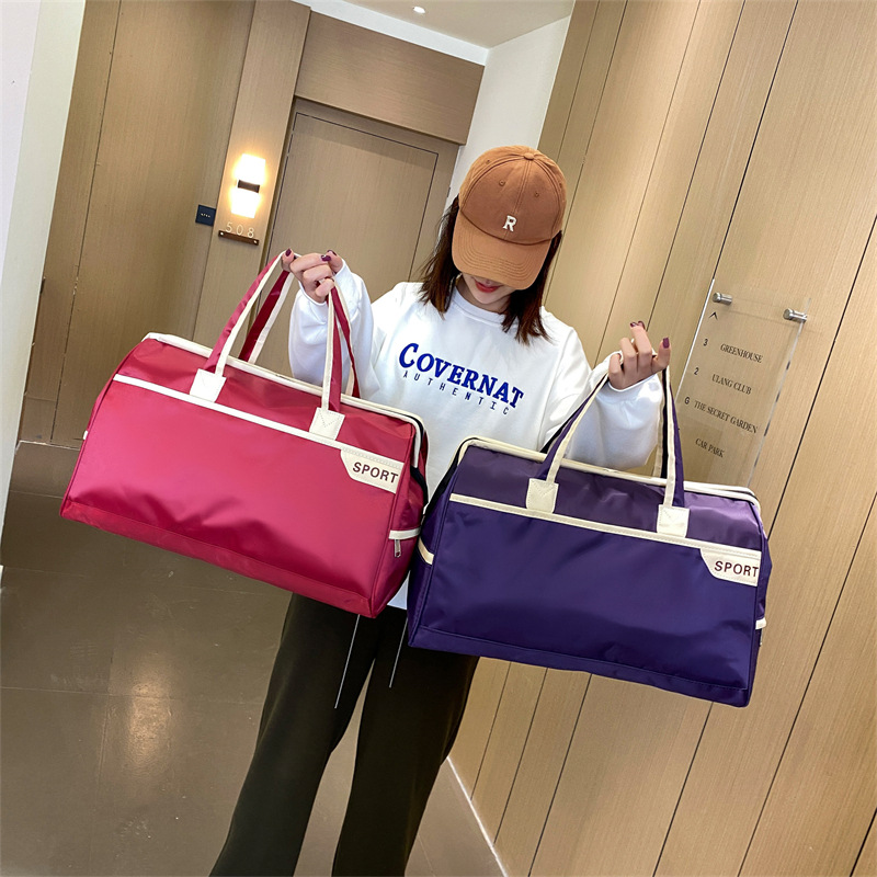The 2024 new style of fashionable travel bag is a simple and stylish short-distance travel sports and fitness bag with large storage capacity details Picture