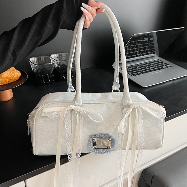 Korean niche and trendy denim baguette bag for women, 2025 new style hand-carried sausage bag, casual and versatile single-shoulder armpit bag full figure