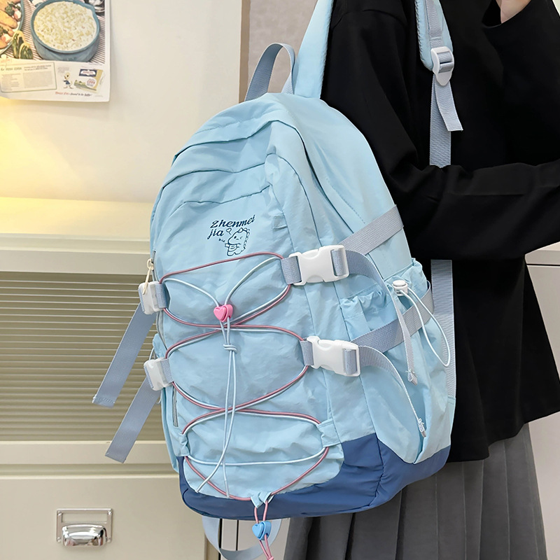 This backpack is light and versatile for women, with a laid-back style. It has a high level of appearance and a drawstring. It is a large-capacity travel backpack and a school bag for college students details Picture