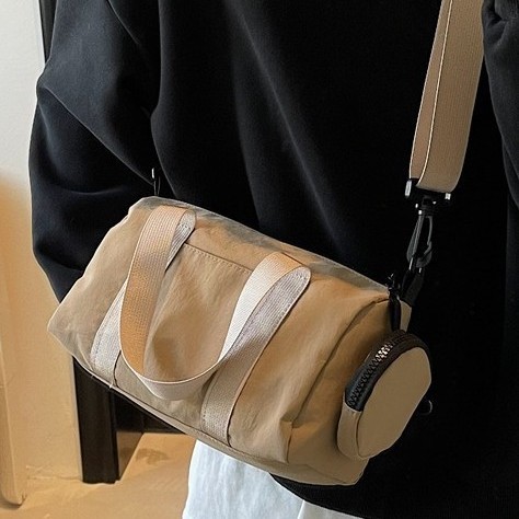 Solid-color zipper single-shoulder bag, commuter bucket bag, tote bag, underarm niche trendy single-shoulder, internet-famous crossbody bag Application Scenario
