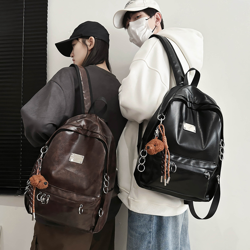 American retro punk cool rivet backpack, new autumn and winter large-capacity commuting computer backpack, school bag full figure