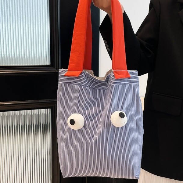 Cute 2025 New Style High-end and versatile Tote striped fabric bag, versatile single-shoulder large-capacity hand-held shopping bag for women Application Scenario