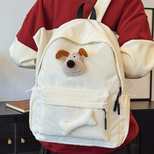 Korean style schoolbag, high appearance level backpack, female junior high school student's corduroy solid color bone dog simple large capacity backpack Application Scenario