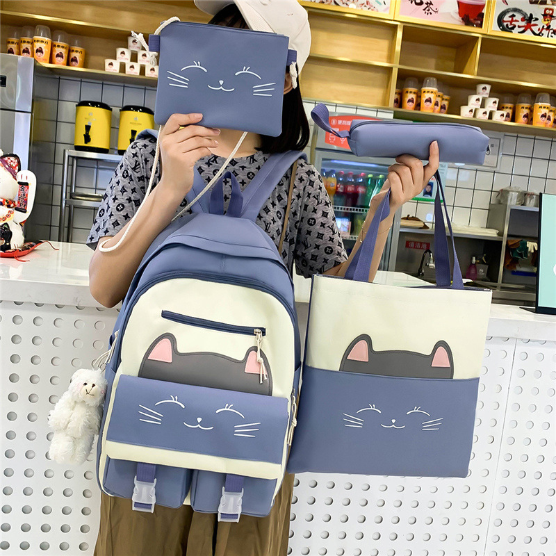 A new Korean-style schoolbag for girls, featuring cute cartoon cats, is a four-piece backpack set for grades three to six Specification drawing