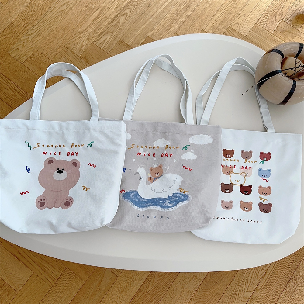 3854 large-capacity tote bag for women, 2023 new trendy cartoon bear print shopping bag, single-shoulder bag, canvas bag full figure