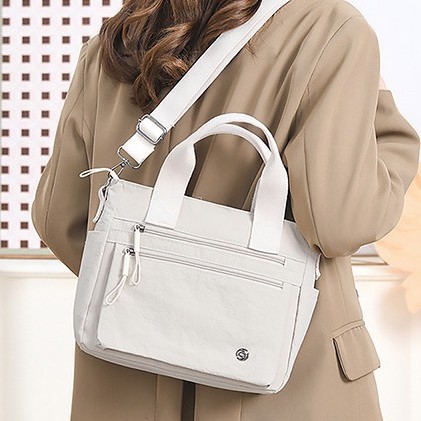 New solid color single-shoulder crossbody handbag, casual and fashionable mommy bag, business commuting multi-functional crossbody bag details Picture