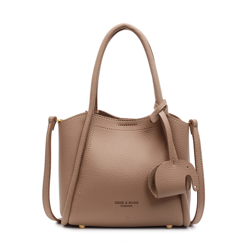A versatile and simple hand-held small bag for women, a new style of fashionable commuting tote bag for 2025, a stylish and high-end quality crossbody bag Item Picture