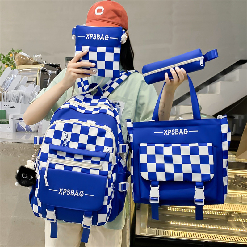 Wholesale of four-piece sets of cross-border Korean version casual backpacks for middle school students, large capacity checkered simple backpacks full figure