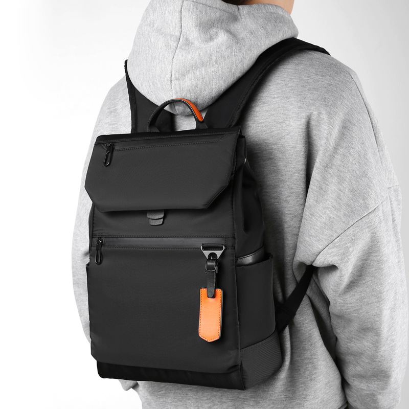Cross-border new products: simple and casual travel backpack, men's cool solid color computer bag, business commuting bag full figure