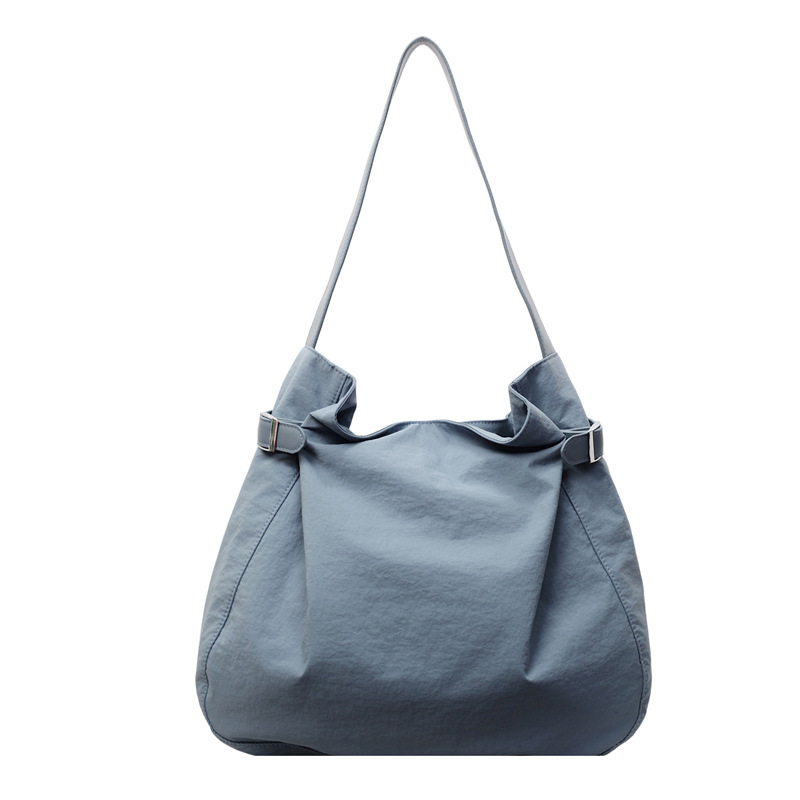 This Korean niche casual and simple tote bag exudes a feminine charm and is a lightweight nylon large-capacity single-shoulder bag for commuting Item Picture