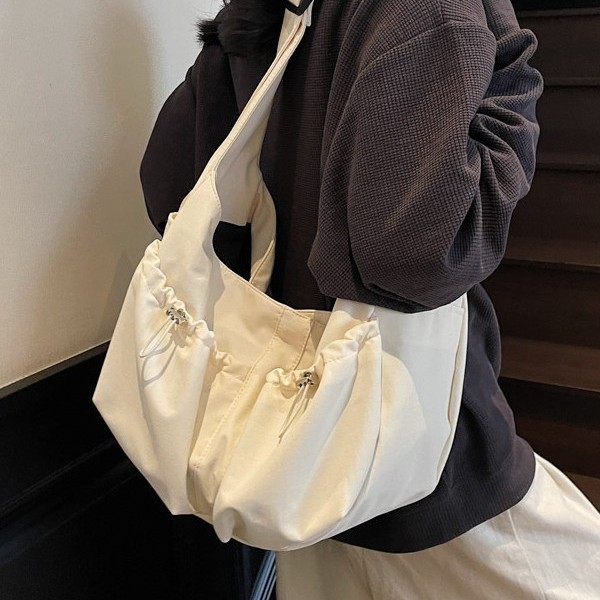 The new Korean-style dumpling bag is a large-capacity, simple and lightweight single-shoulder crossbody bag with a niche design sense for casual women details Picture