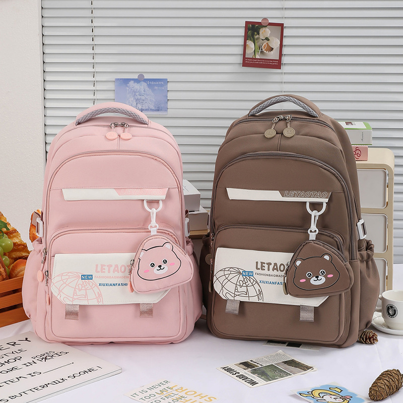New lightweight and lightweight backpack for junior high school students, female primary school students in grades three, four and five, large-capacity color-blocking backpack full figure