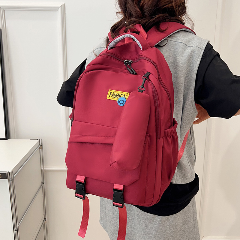 A new English-embroidered Korean version of a large-capacity student bag for 2025, fashionable and trendy, versatile backpack for commuting full figure