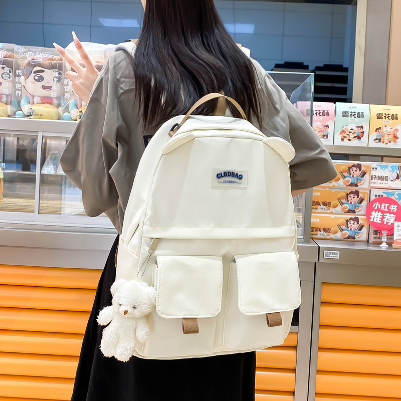 Simple and casual backpack for girls, 2025 new large-capacity Korean style trendy cartoon ear schoolbag for junior and senior high school students details Picture