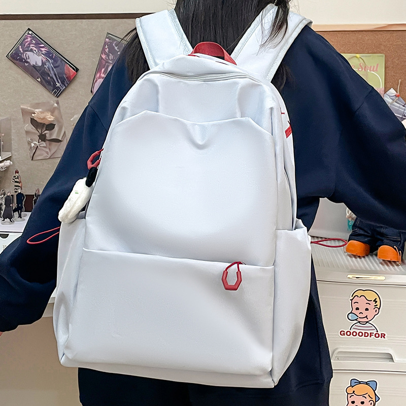 Forest-style high-appearance-level female college student backpack, simple solid color large-capacity travel backpack for both men and women, 2025 new style Application Scenario