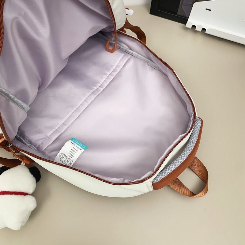 2024 New schoolbag: Cool, large-capacity, high-appearance-level backpack for junior high school boys, and a couple backpack for female college students Application Scenario