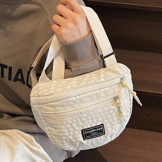 Stylish underarm texture crossbody women's bag 2025 New solid color retro fresh style fashionable design single-shoulder crossbody bag full figure